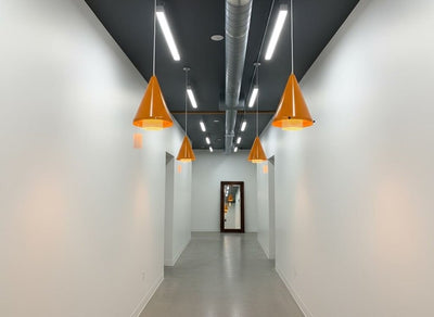 FABULOUS Pair of Gerald Thurston Pendant Lamp - Powder Coated in Orange with White Perforated Cylinder Floating in the Interior