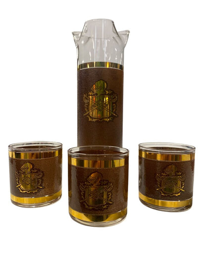 MCM Coat of Arms Gold and Brown Decanter and Glass Set