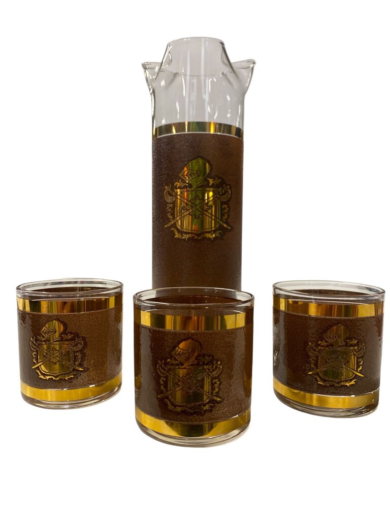 MCM Coat of Arms Gold and Brown Decanter and Glass Set