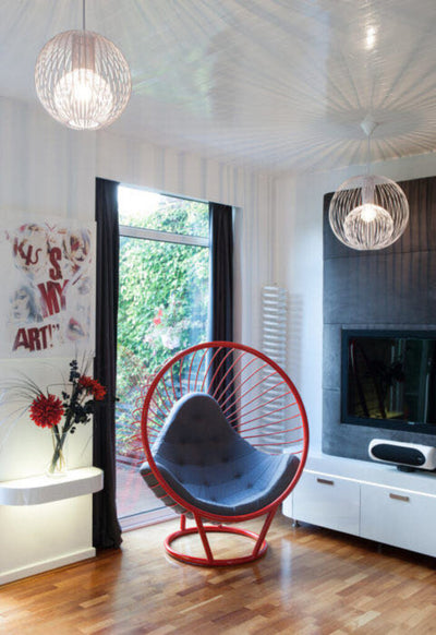 Floor standing bubble chair with whispering silver frame and dark grey cushion by Ben Rousseau